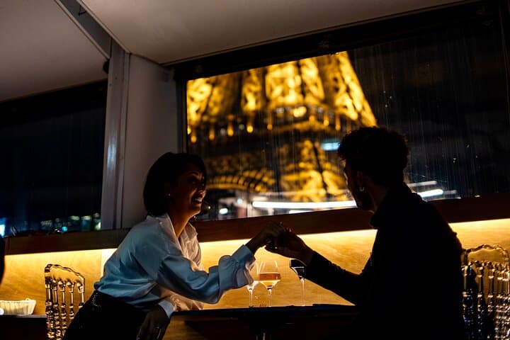 Paris Seine Dinner Cruise: Rooftop Aperitif, 3‑Course Meal & Live Singer photo 2