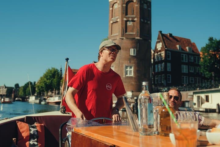 Open-Boat Amsterdam Canal Cruise — 60-Min Guided Tour with Local Hosts photo 2