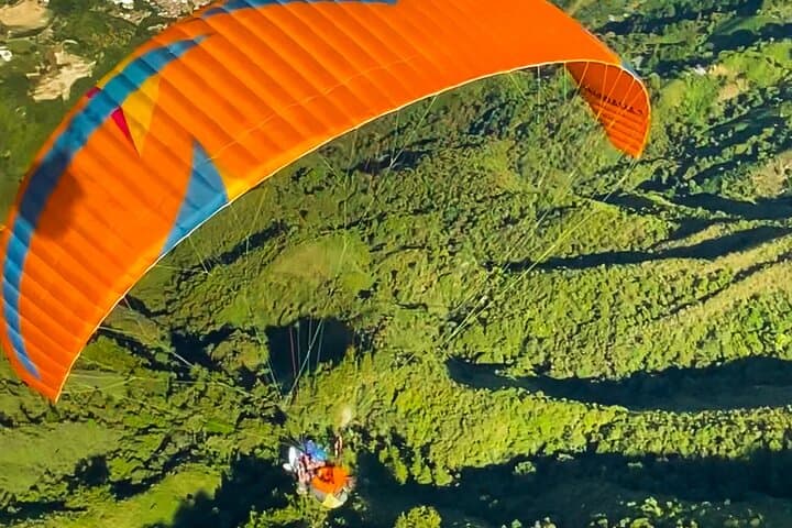 Soar Over Medellín: Paragliding from San Félix with Pickup