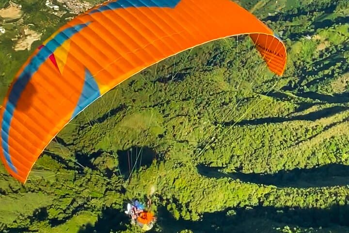 Soar Over Medellín: Paragliding from San Félix with Pickup photo 5