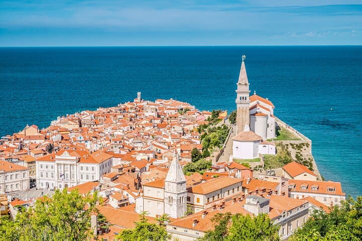 Postojna Cave, Predjama Castle & Piran: Underground Trains, Cliff Castles and Adriatic Strolls