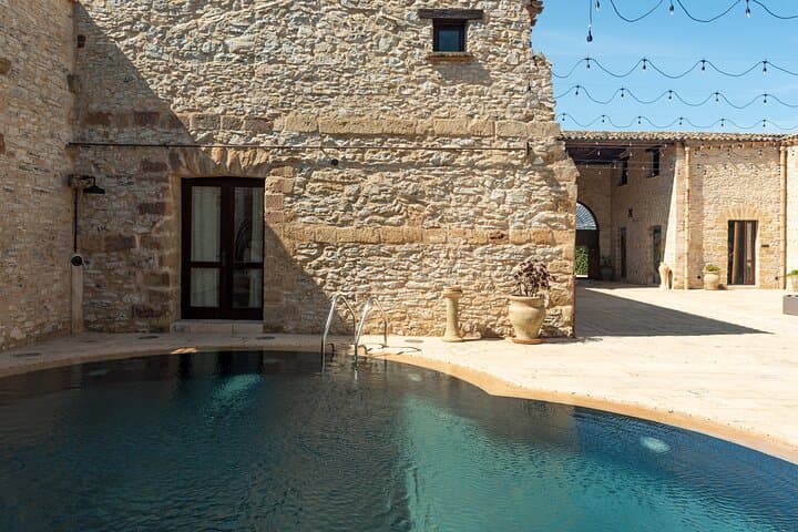 Poolside Serenity at Tenute Baglio Passofondo: Sicilian Countryside Relaxation photo 3