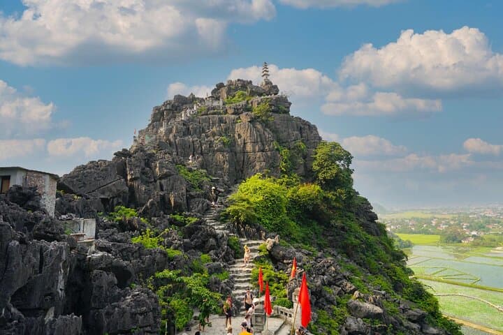 Full-Day Ninh Binh: Hoa Lu Ancient Capital, Tam Coc Boat Ride & Mua Cave Climb