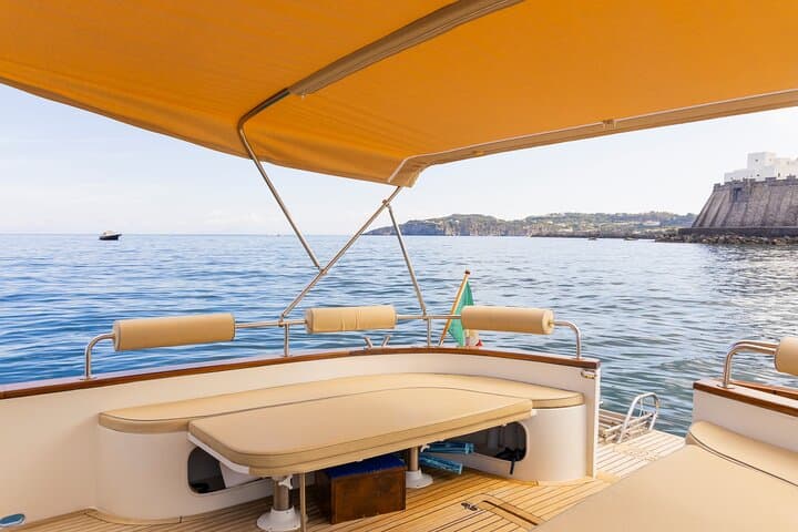 Circumnavigate Ischia: Small-Group Boat Excursion with Lunch and Swim Stops photo 3