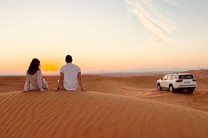 Dubai Red Dunes Sunrise & Sunset Desert Safari with Camel Ride, Falconry and Sandboarding photo 5