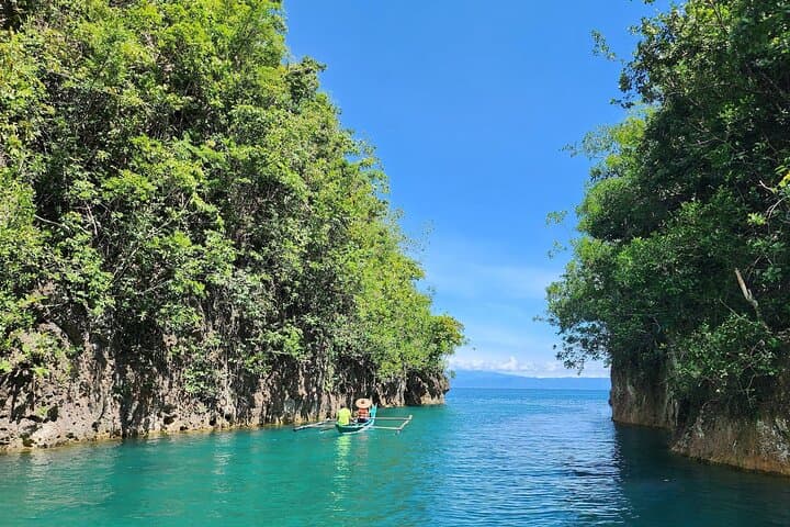 Aloguinsan Nature Escape: Bojo River Cruise, Mantayupan Falls & Hermit's Cove