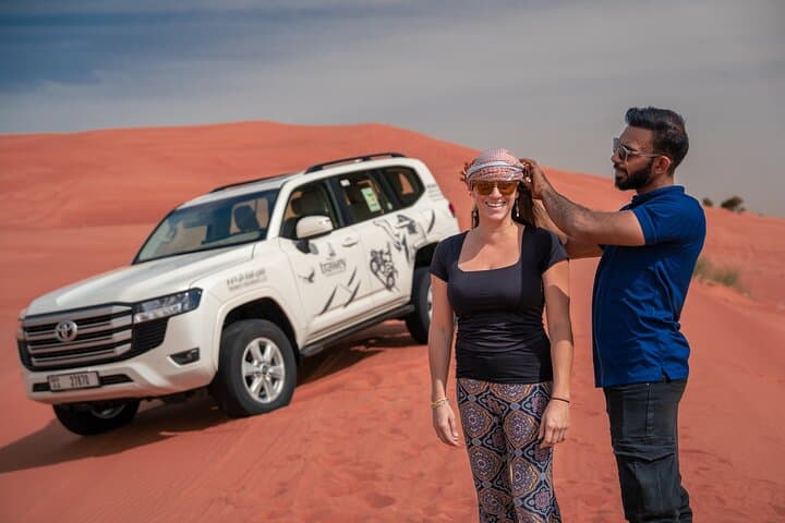 Red Dune Desert Safari in Lehbab: Dune Bashing, Sandboarding & Camel Rides photo 4