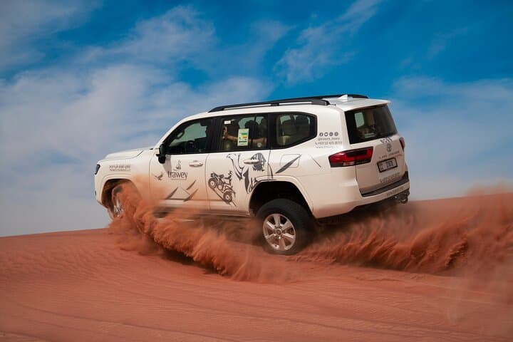 Red Dune Desert Safari in Lehbab: Dune Bashing, Sandboarding & Camel Rides photo 3