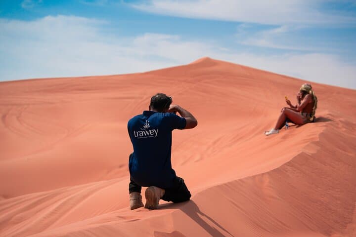 Sunset Dubai Desert Safari with Pro Photographer: Dune Bashing & Camel Rides photo 5