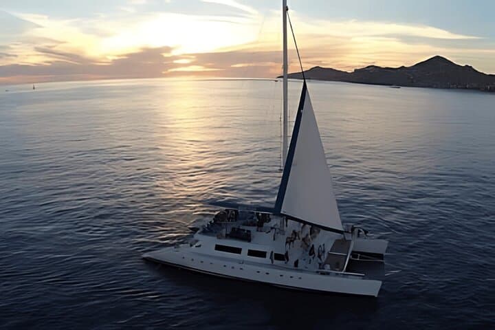 Cabo Sunset Catamaran Cruise to El Arco with Open Bar