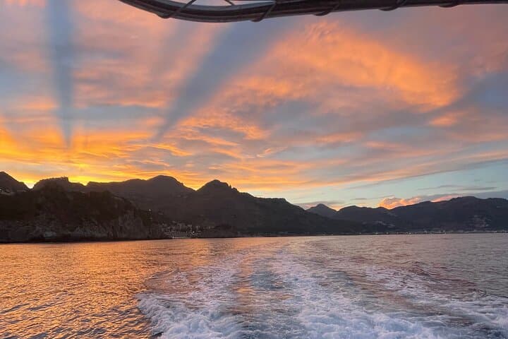 Sunset Boat Excursion in Taormina: Isola Bella, Blue Grotto & Mount Etna Views photo 2