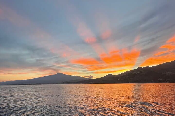 Sunset Boat Excursion in Taormina: Isola Bella, Blue Grotto & Mount Etna Views photo 3