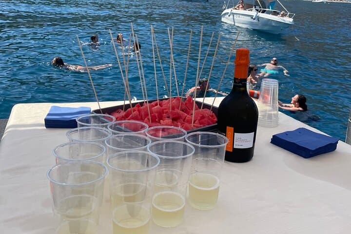 Sunset Boat Excursion in Taormina: Isola Bella, Blue Grotto & Mount Etna Views photo 4