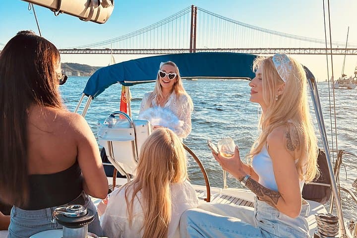 Lisbon Land & River Sunset: Tuk-Tuk City Tour + Tagus Sailing Cruise photo 1