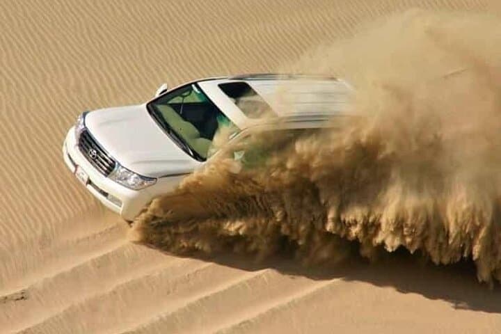 Doha Desert Safari: Sunrise & Sunset Sandboarding and Camel Ride to Khor Al Adaid photo 3