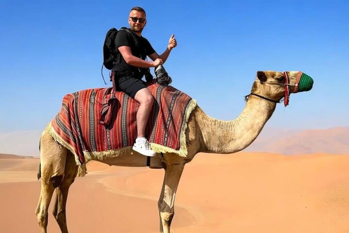 Private Abu Dhabi Desert Safari: Dune Bashing, Camel Ride & Bedouin Dinner Experience photo 5