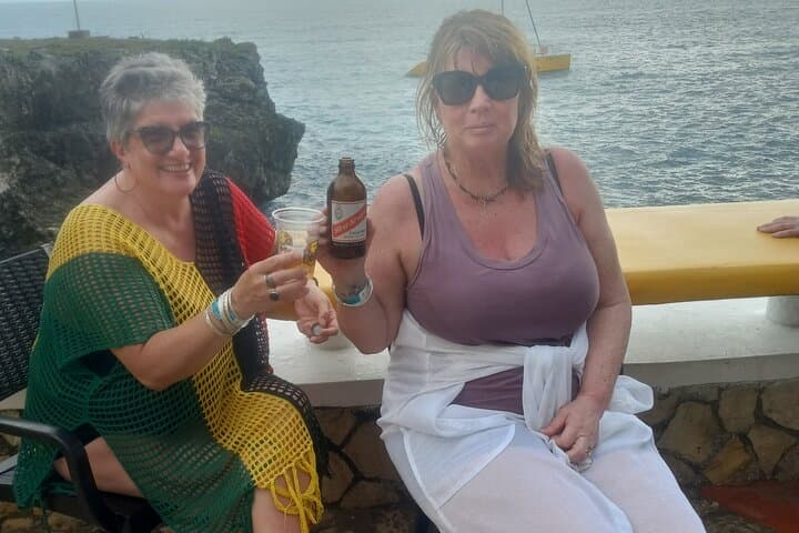 Negril Sunset at Rick's Cafe: Cliff Divers, Reggae, and Coastal Views photo 2