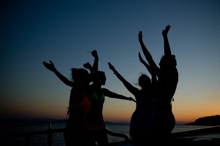 Athens Riviera Evening Cruise: Music, Swimming & Sunset Views on the Saronic Gulf