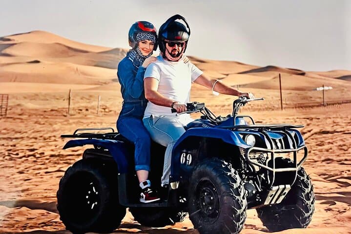 Dubai Red Dunes Safari: ATV Quad, Camel Ride & Desert BBQ Experience