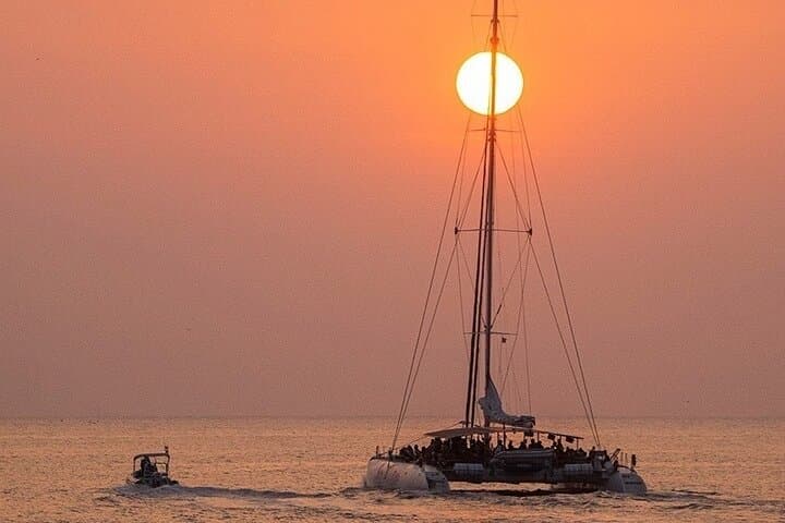 Sunset Catamaran Party in Lloret de Mar: DJ, Drinks & Swim on the Costa Brava photo 2
