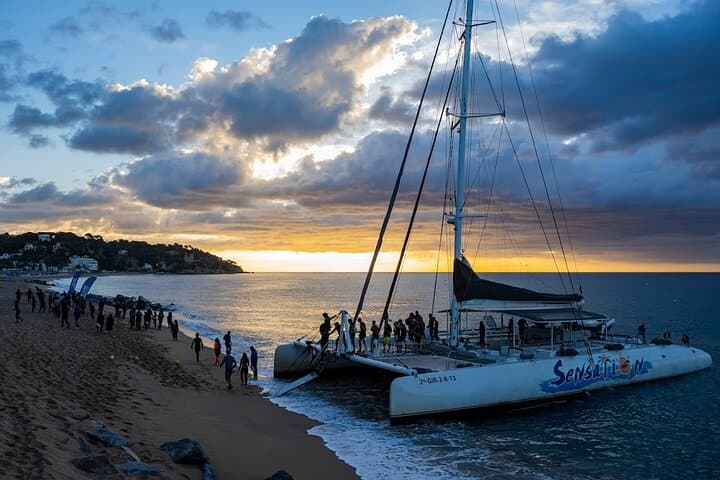 Sunset Catamaran Party in Lloret de Mar: DJ, Drinks & Swim on the Costa Brava photo 5