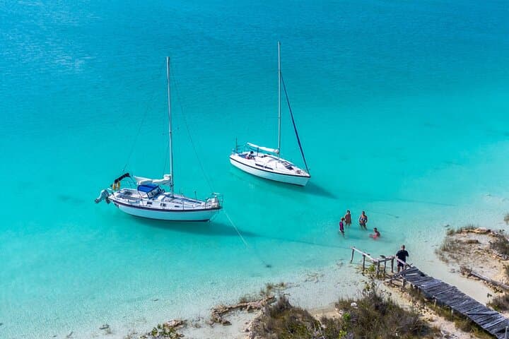 Slow Sailing Bacalar: Wind-Powered Lagoon Cruise to Cenotes and Bird Island