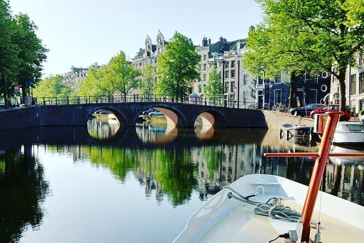 Early Morning Amsterdam Canal Cruise on a 1928 Royal Saloon Boat photo 3