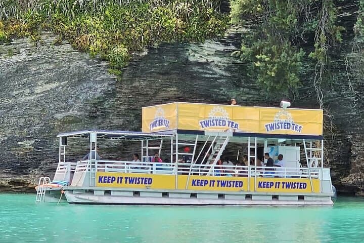 Twisted Tea Pontoon Party Boat: Bermuda Dockyard Snorkel, Shipwrecks & Cliff Jumps