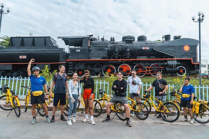 Saigon Railway Ride to Phu Chau Floating Temple — Half‑Day Cycling Tour