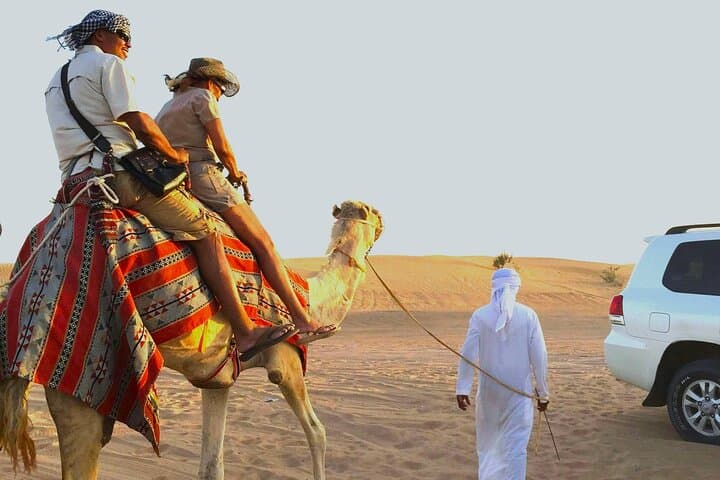 Private Morning Desert Safari in Dubai: Dune Bashing, Sandboarding & Camel Rides photo 1