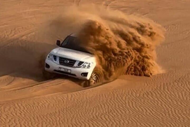 Dubai Private Morning Desert Safari: Dune Bashing, Camel Ride & Sandboarding photo 3