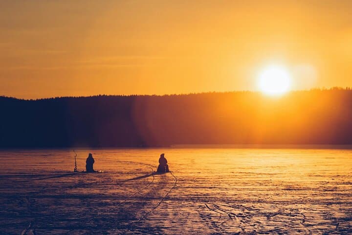 Ice Fishing in Levi: Guided Arctic Lake Experience in Lapland