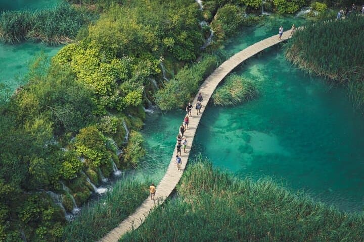 Day Trip to Plitvice Lakes from Split — Guided Tour with Boat, Train & Boardwalks photo 4