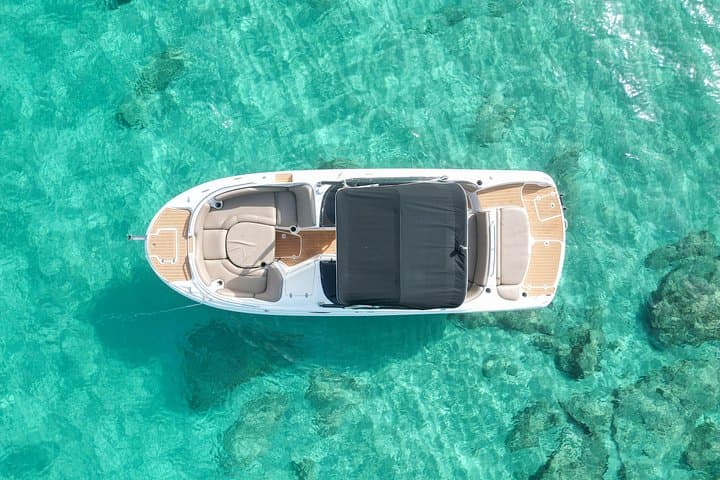 Ibiza Small-Group Boat Cruise with Paddle Surfing and Snorkeling from San Antonio photo 1