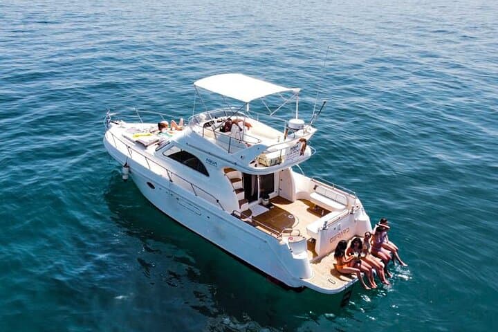 Puerto Banús Private Yacht Charter: 15m Gerard Yacht with Drinks, Snorkel & Dolphin Watching