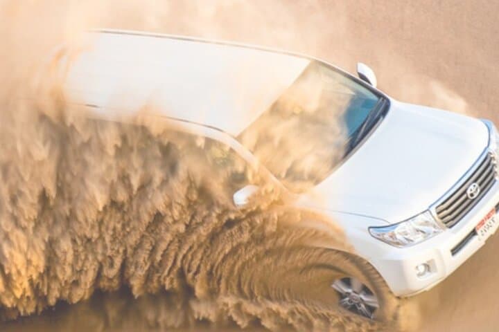 Dubai Red Dune Desert Safari: Evening Dune Bashing, Camel Rides & BBQ Experience photo 5