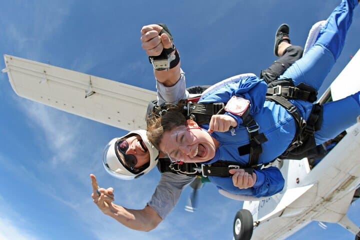 Skydive Over Barcelona: 13,000ft Tandem Jump with Round-Trip Transport