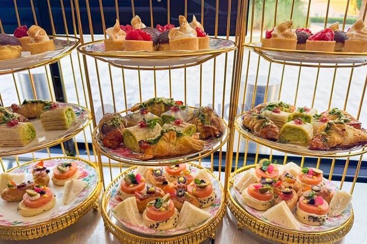 Dubai Bustronomy: Gourmet Afternoon Tea Bus Tour at Sunset photo 5