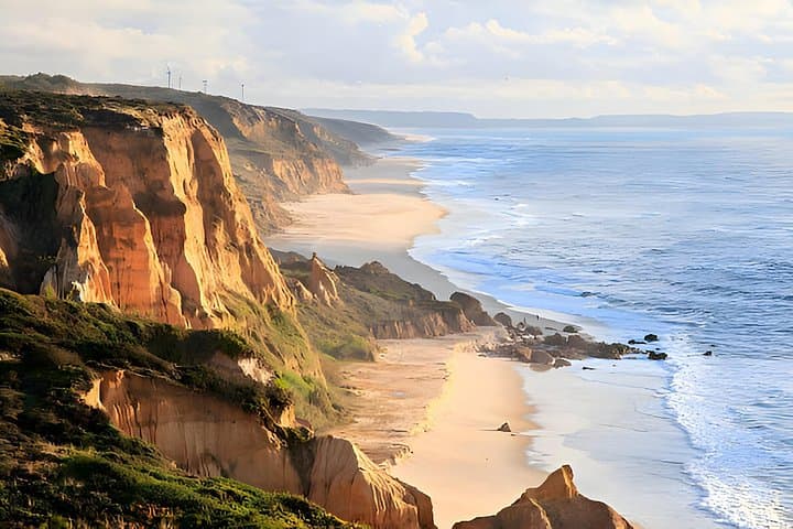 Lisbon Day Tour: Óbidos, Nazaré & Fátima — Medieval Walls, Giant Waves and Pilgrimage photo 1