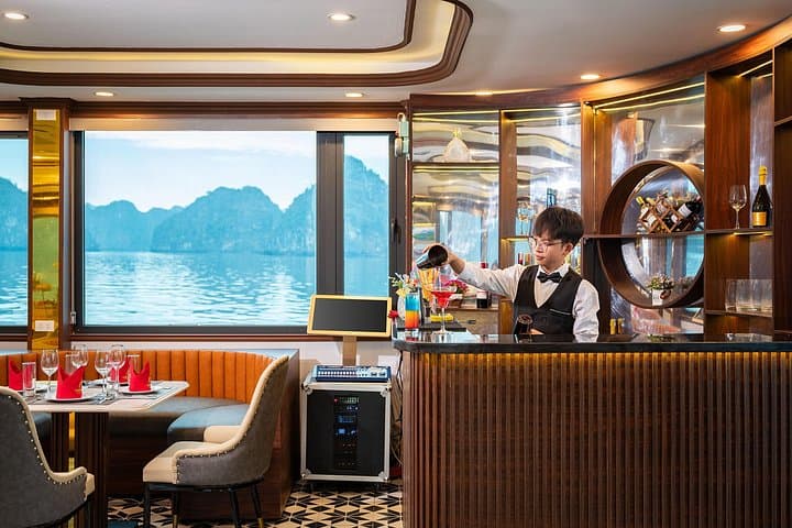 Halong Bay Full-Day Cruise: Sung Sot Cave, Kayak Luon Cave & Titov Sunset photo 2