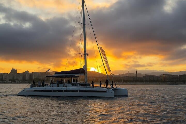 Sunset Sail in Barcelona: Shared Catamaran with Music & Drinks