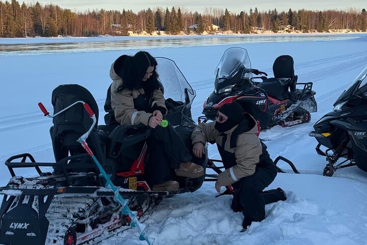 Lapland Snowmobile Safari with Ice Fishing and Northern Lights Hunt