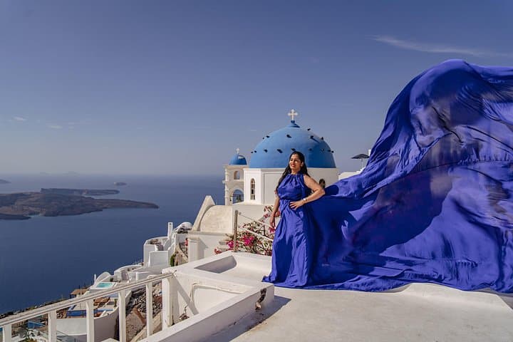 Flying Dress Photoshoot in Oia: Private Blue Dome Experience in Santorini photo 2