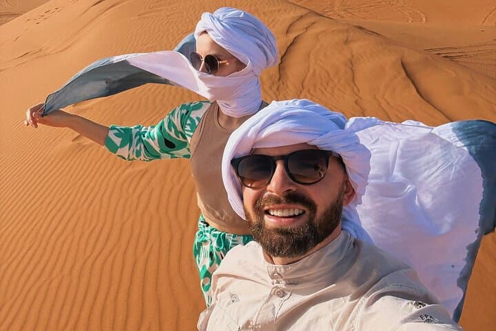 Private Abu Dhabi Morning Desert Safari: Camels, Sandboarding & Dune Bashing