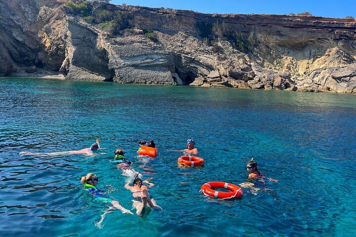 Family Boat Trip to Sa Conillera: Snorkel, Paella & Paddle from San Antoni photo 4