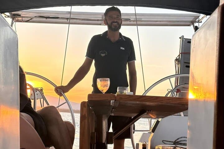 Sunset Sailing in Alghero: 2-Hour Aperitif Cruise with Snorkel & SUP