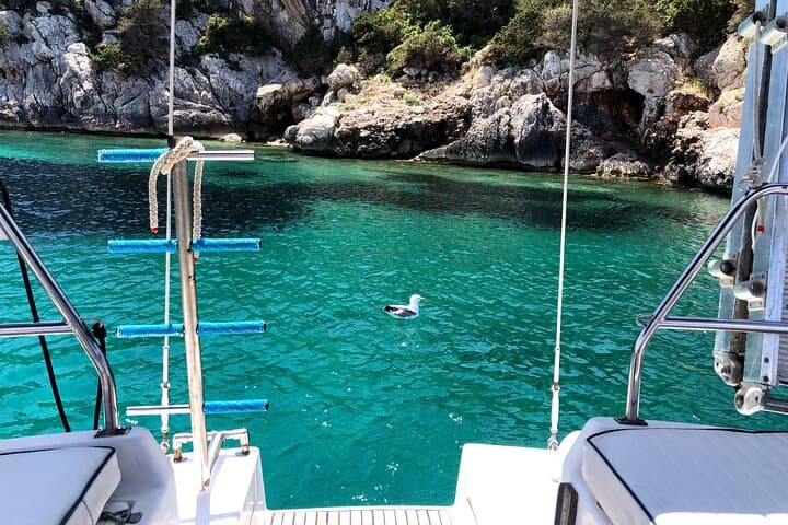Sail Alghero: 15m Boat Cruise with Lunch, Snorkeling & SUP to Capo Caccia photo 2