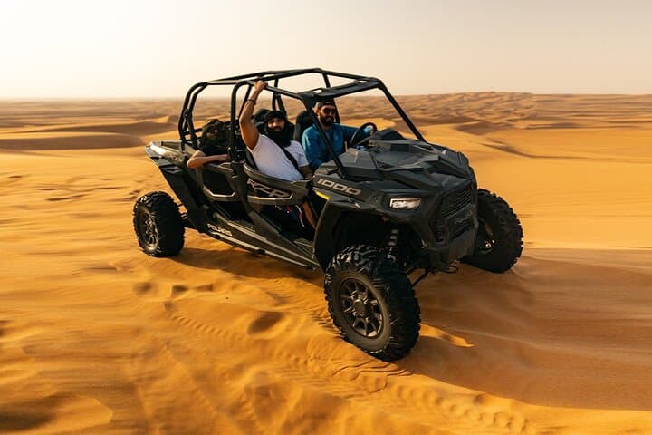 Dubai desert buggy dune bashing, sandboarding, camel ride & Bedouin camp experience