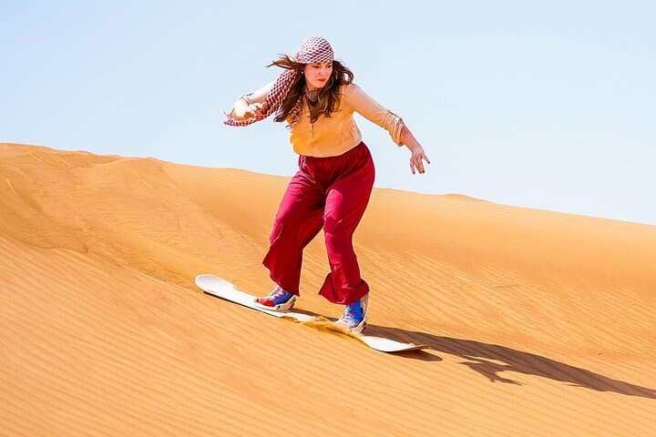 Dubai desert buggy dune bashing, sandboarding, camel ride & Bedouin camp experience photo 2
