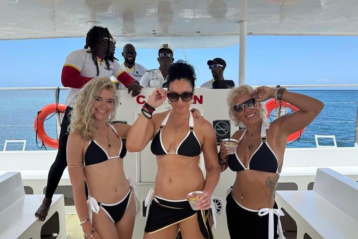 Negril Catamaran Sunset Cruise to Rick's Cafe — Snorkel, Cliff Views & Reggae